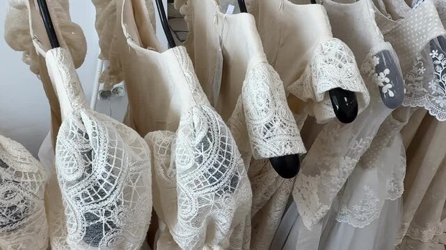 White lace bodices create delicate texture, perfect for fashion or wedding-themed backgrounds