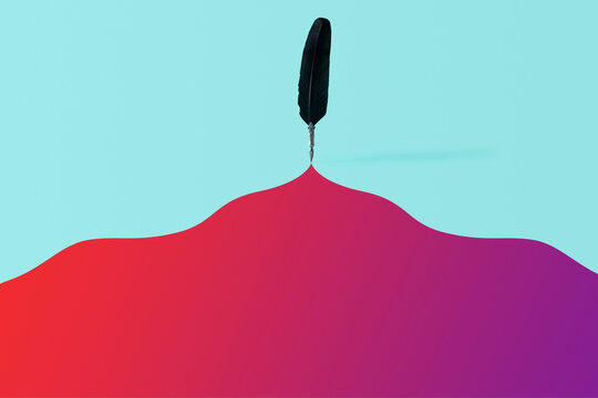 Quill pen leaving a colorful trace over cyan background