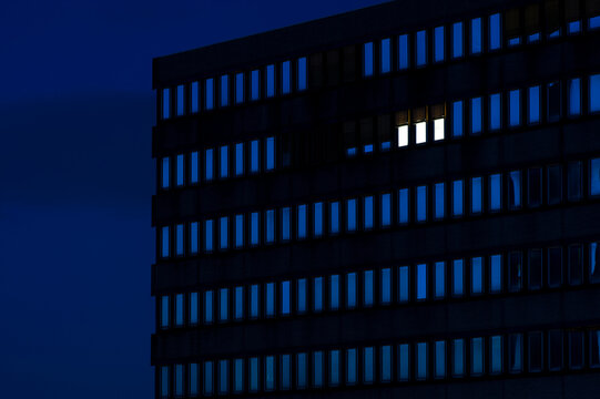 Germany, Dusseldorf, Lighted windows in office building