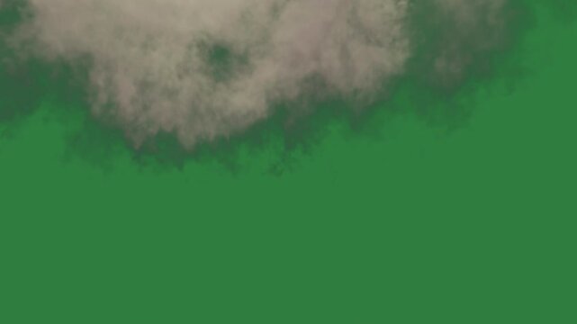 Clouds floating in the air lot of on smoke coming from it out cloud isolated on green screen background