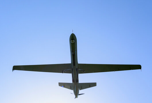 MQ 9 Reaper drone of the Dutch Airforce flying in a clear blue sky