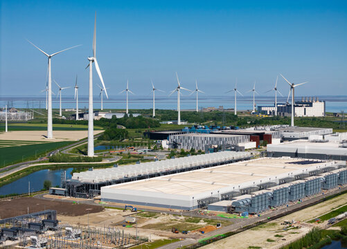 Aerial view of data center and wind turbine in Eemshaven