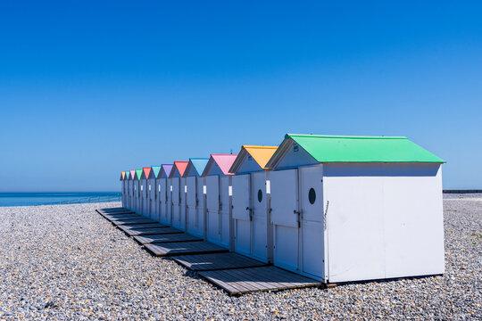 Colorful beach huts in a row at Le Treport Normandy France