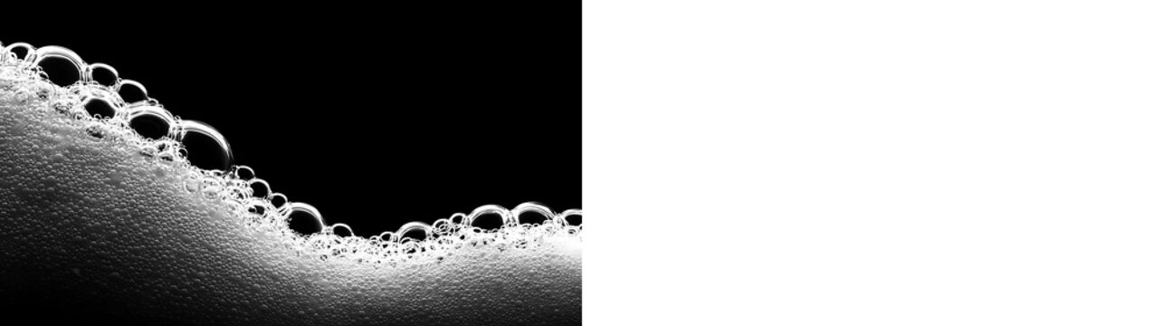 White soap suds and foam wave on black and transparent background. Clean bubble texture graphic element. Cosmetic lather or washing concept