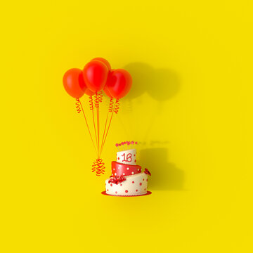 Red balloons float near a sweet sixteen cake on a yellow background