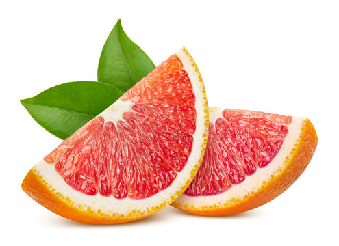 Fresh organic red orange segments and leaves isolated on white background with clipping path. Detailed red orange slices with greenery are perfect for food packaging