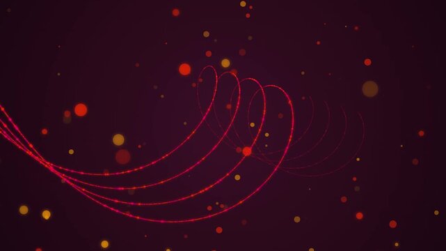 Flowing red light trails and golden glowing particles moving across a dark maroon space environment