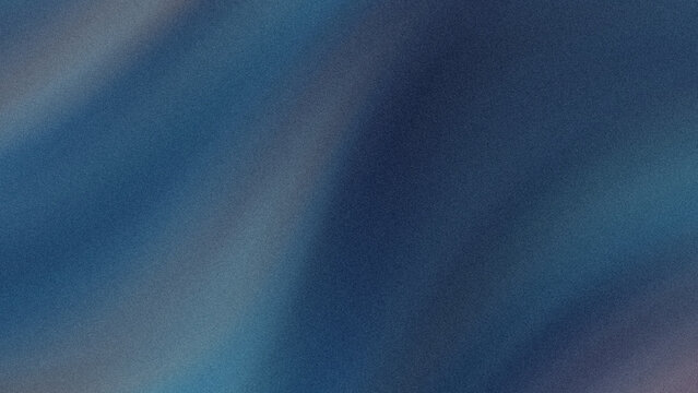A close up view of dark blue denim fabric showing texture and subtle color variations in the material