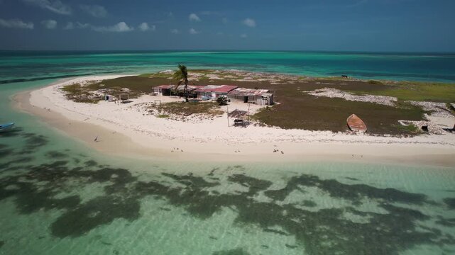 Aerial View of a Secluded Tropical Cay with a Rustic Beach Shack in the Caribbean, Los Roques, Venezuela