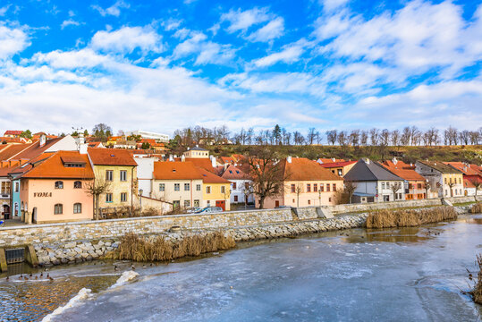 Frozen Jihlava River and colorful houses of the Jewish Quarter, a UNESCO World Heritage site in Trebic.