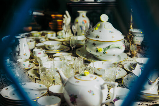 Vintage tableware on sale in the antique shop.
