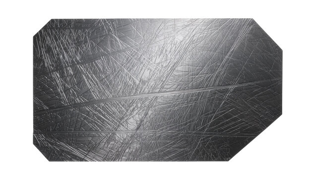 Isolated metallic fragment with intricate scratched surface texture, abstract background element