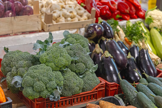 Broccoli and Aubergine Organic Healthy Fresh Vegetables at Farmers Market Stall
