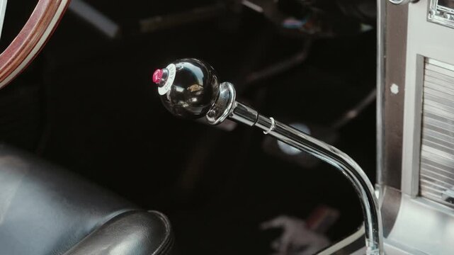 Close up of vintage Shelby GT500 gear shift knob and lever