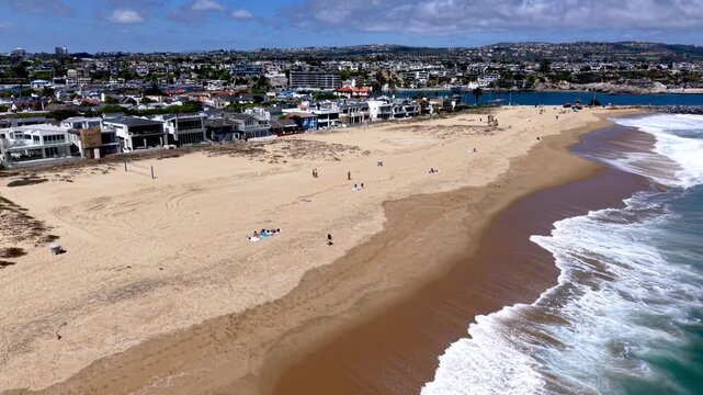 aerial push along newport beach california surf and beachfront