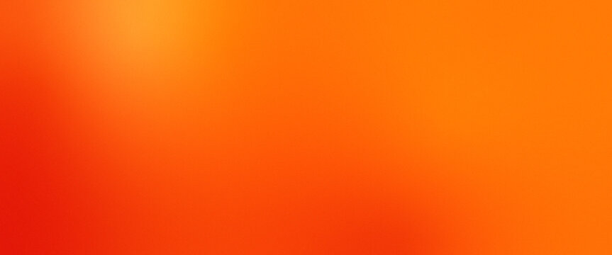 Abstract bright orange and red gradient background with soft radial light bloom, vibrant modern mesh backdrop for autumn sale, summer banner, and corporate presentation template