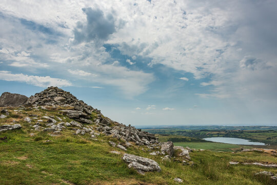 Lovely Summer day landscape image of Rough Tor on Bodmin Moor in English countryside