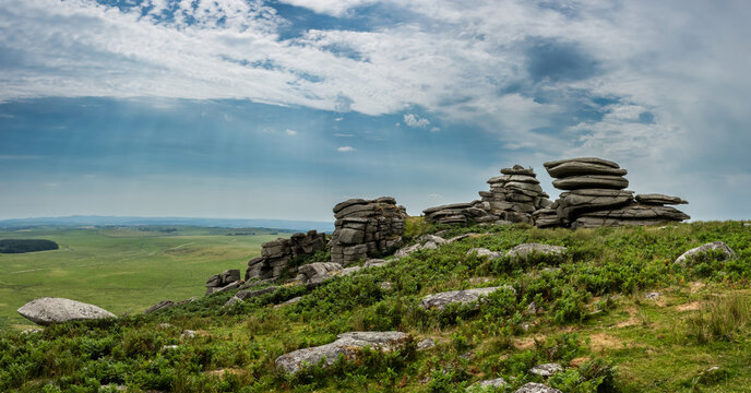 Lovely Summer day landscape image of Rough Tor on Bodmin Moor in English countryside