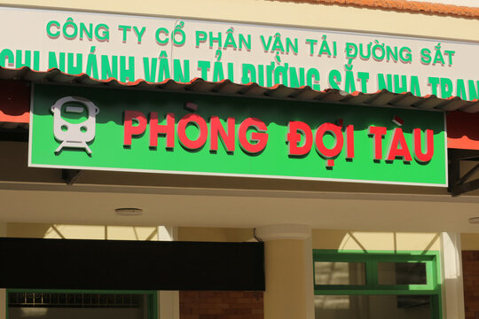 NHA TRANG, VIETNAM - JANUARY 26, 2026: A close-up view of the Vietnamese railway branch signage with green text and a train icon above the entrance.