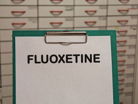 FLUOXETINE SSRI antidepressant for depression anxiety and bulimia displayed on a clipboard in a pharmacy