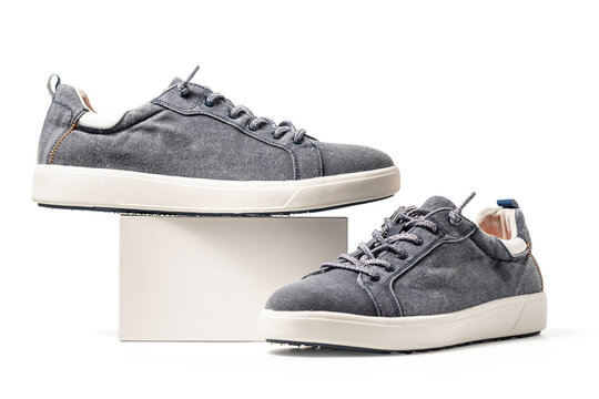 Blue Canvas Sneakers. Sport shoes isolated on white background, clipping path included