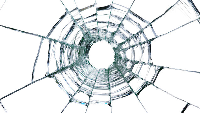 Isolated shattered glass with bullet hole effect, intricate cracks radiating from impact point