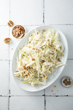 Cabbage salad with celery and walnut