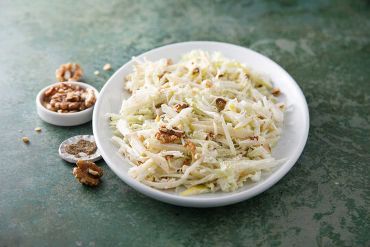 Cabbage salad with celery and walnut