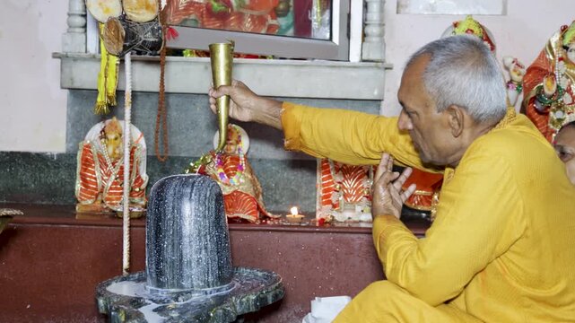Panchamirtha Offering To Shiva Lingam During Sacred Hindu Temple Ritual