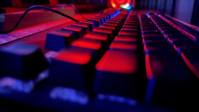 Modern gaming keyboard with dynamic red and blue backlighting for gamers