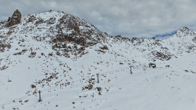 snow-capped mountains, 2,000 meters above sea level