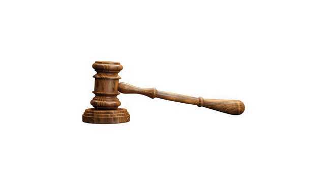 Gavel standing upright on a round wooden block conveys the concept of legal order and the authority of a judge presiding over a trial in a professional courtroom setting that demands total respect.