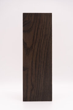 A close up of dark wood grain.