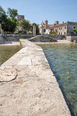 Fototapeta premium Stone pier leading to Dajla monastery in Istria, Croatia.