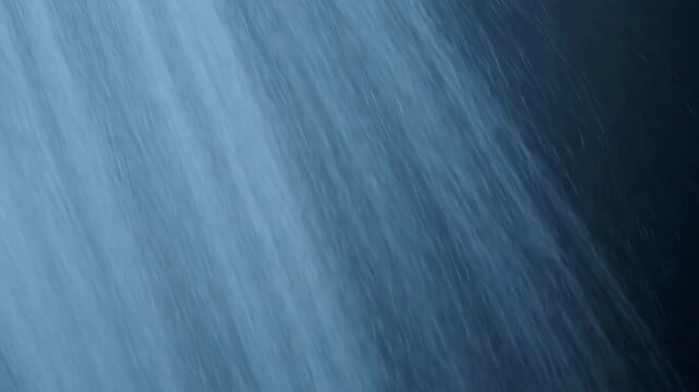 Abstract blue gradient background with diagonal light streaks