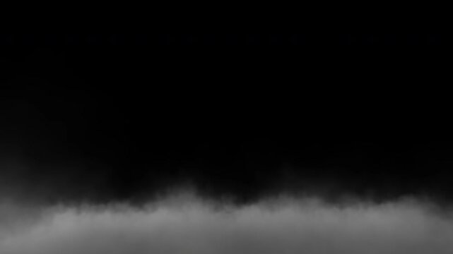 Misty Ground Fog, Wisps of dense fog drift low across a dark, mysterious landscape, obscuring the horizon and creating an atmospheric and moody scene. Loops seamless