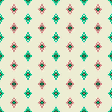 Minimal pixel folk geometric pattern featuring small diamond motifs in soft green and pink on a light cream background. Seamless ethnic-inspired textile design for fabric, wallpaper, wrapping paper, a