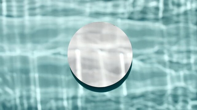 Water texture with waves and reflections sunlight in slow motion. Drop shadow effect with wave refraction of light. Sun and shadows. Motion clean swimming pool ripples and wave. High quality 4k