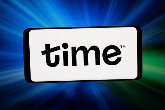 Stuttgart, Germany - 07-16-2026: In this photo illustration, the logo of Malaysian company TIME dotCom Berhad is displayed on a smartphone in front of abstract background on computer screen.