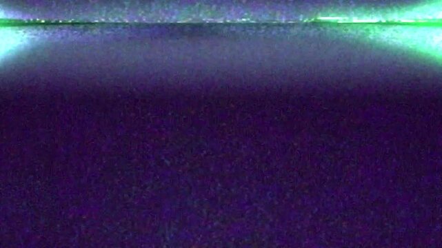Flickering VHS lines on damaged screen vintage television overlay with bright lights and noise