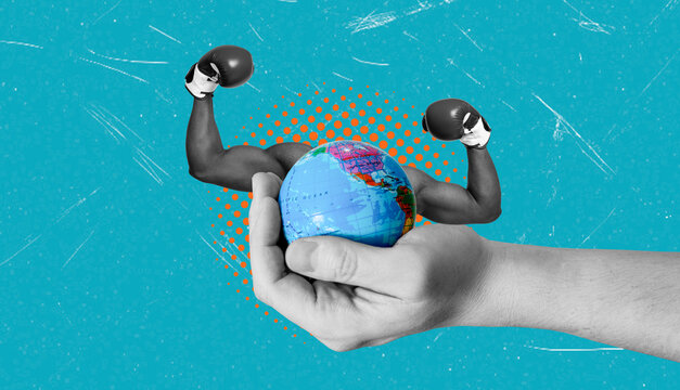 Art collage showing a hand holding the Earth with boxing arms on it