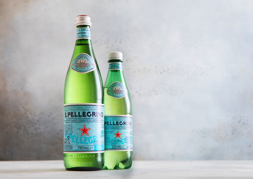LONDON, UK - APRIL 22, 2026: Bottles of San Pellegrino sparkling mineral water on light table background.
