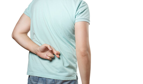 Man crossing fingers behind back while making false promise, isolated on transparent cutout background