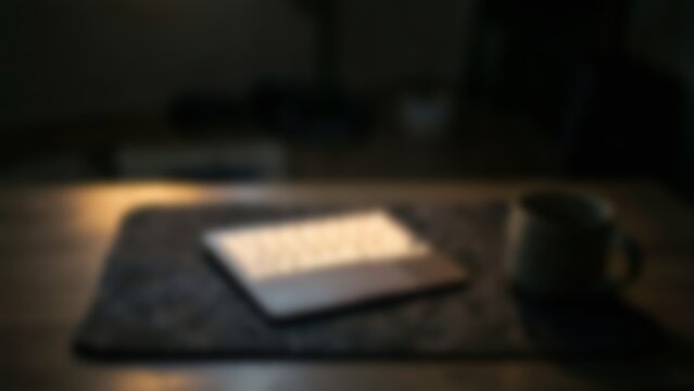 Moody evening glowing laptop desk for secure banking homepage banner