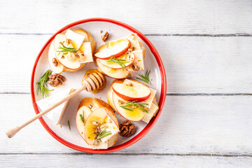 Autumn Apple Brie Crostini with Walnuts and Honey © ricka_kinamoto