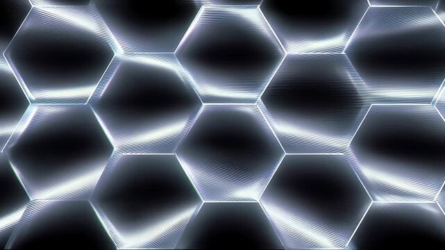 Abstract background featuring glowing silver hexagonal shapes with metallic texture and depth.