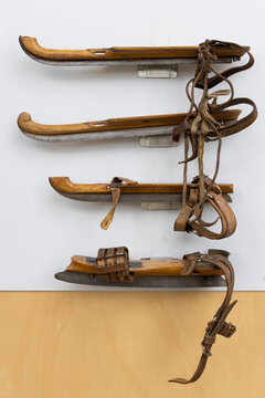 Vintage wooden ice skates on display in museum in IJlst, Friesland, Netherlands highlighting cultural heritage