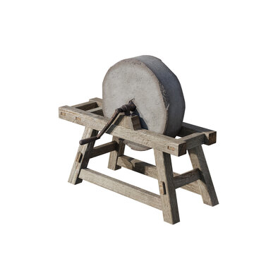 A vintage manual grinding stone machine with a wooden frame isolated on white background.