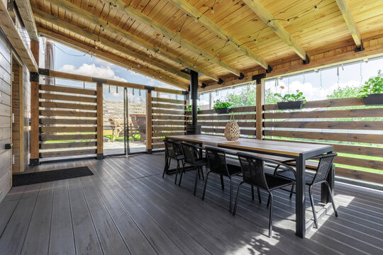 Spacious Covered Terrace Interior with Dining Set