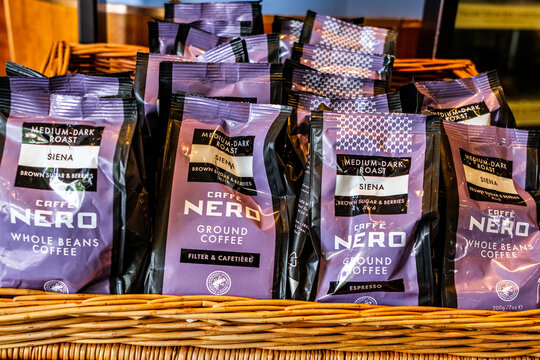  Close-Up Of An In-House Display Featuring Bags Of Caffe Nero Siena Ground Coffee